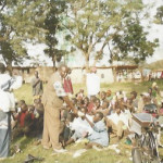 Bro Makona feeding street children