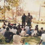 Bro Makona preaching to street children